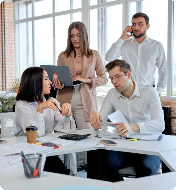 Group of professionals discussing in a meeting room