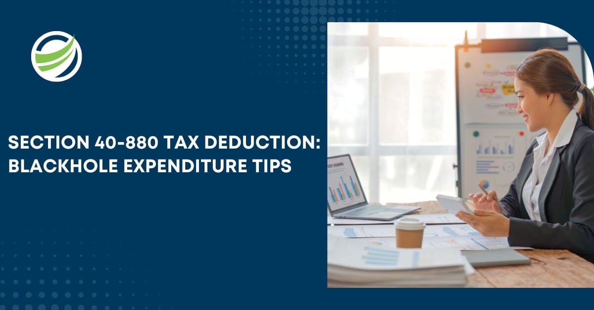 List of startup costs that qualify under Section 40-880, with a person using a calculator and laptop.